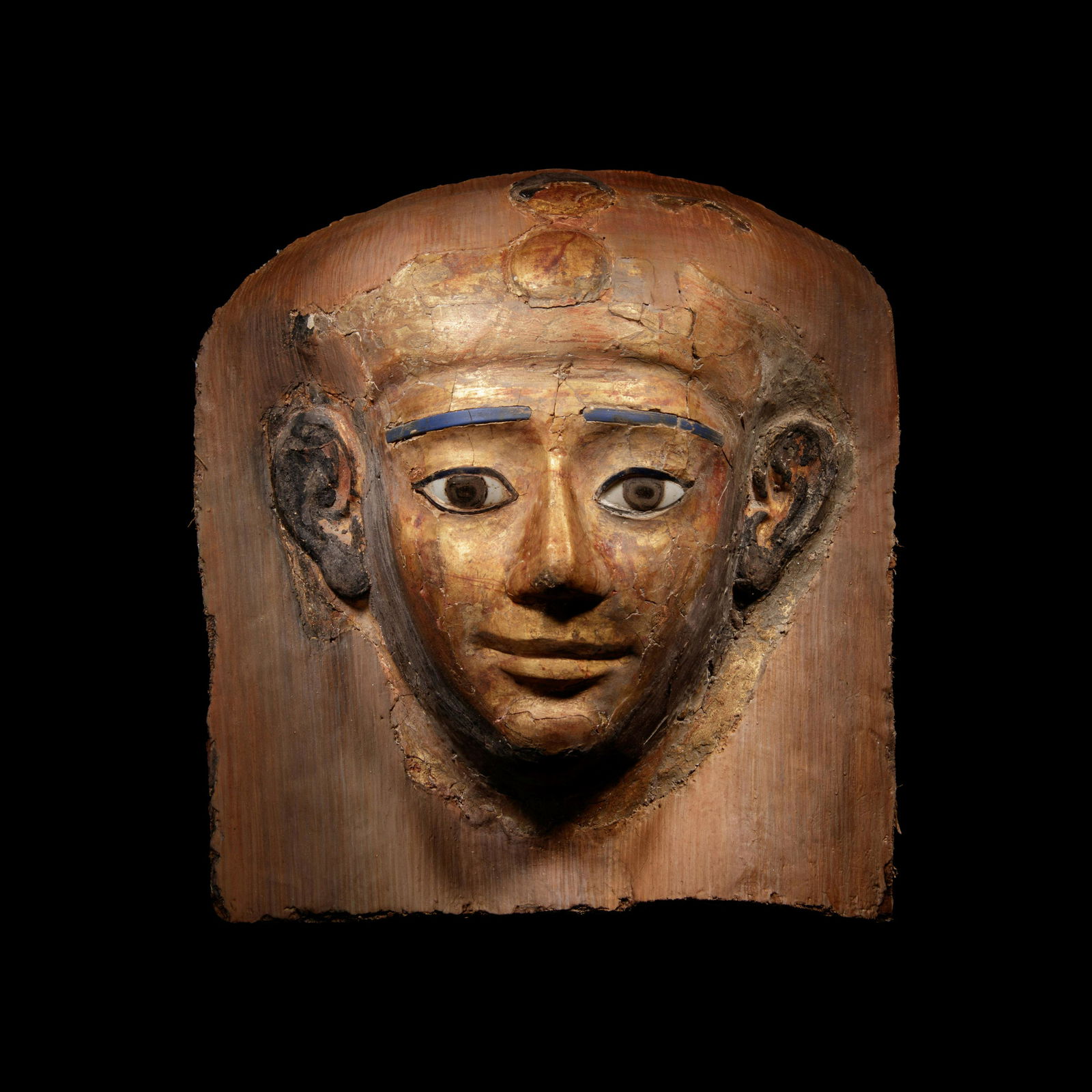 An Egyptian Cartonnage Mummy Mask Height 11 inches. (1 of 2)