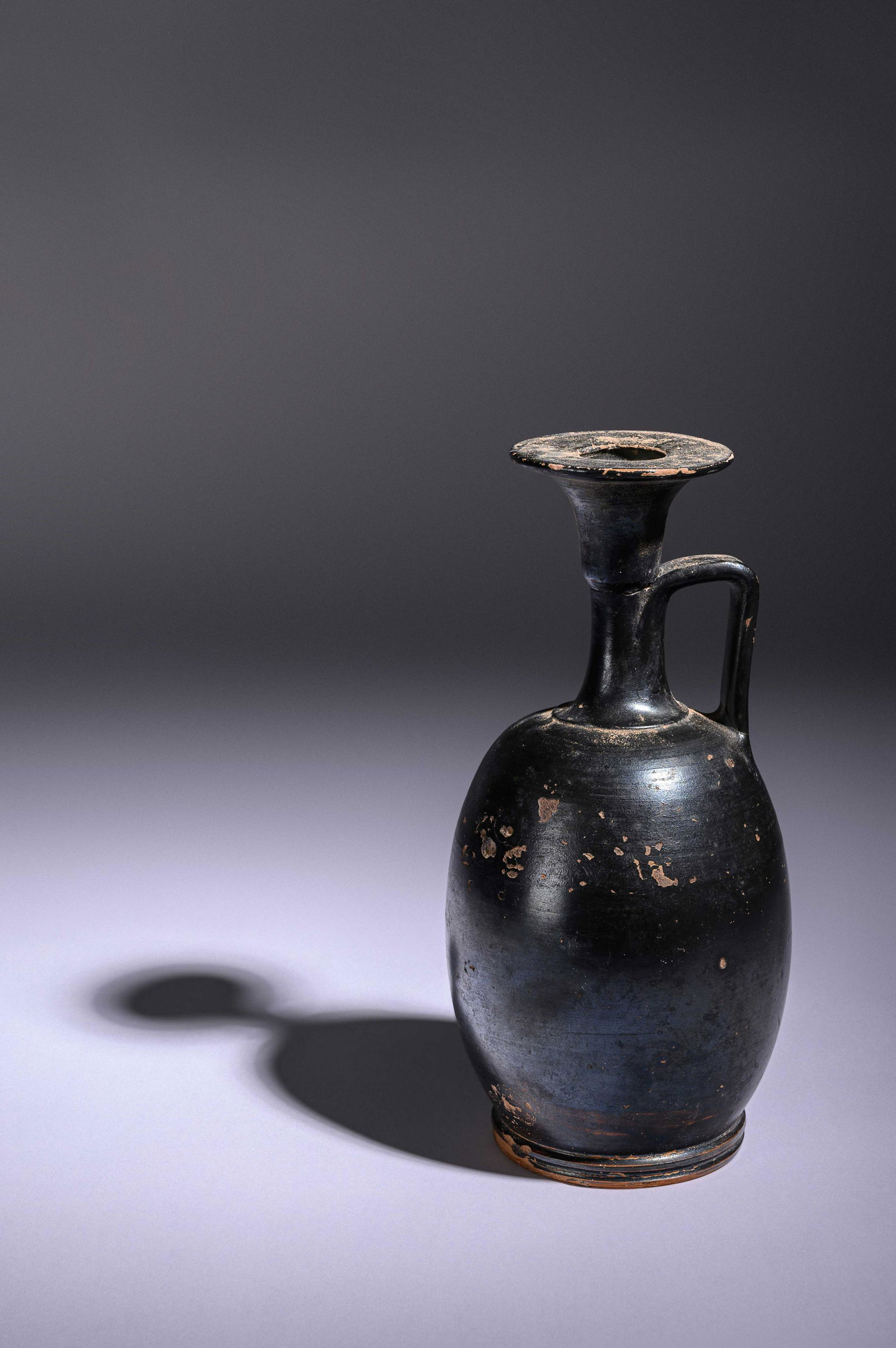 A Greek Black Glazed Lekythos Height 8 3/4 inches. (1 of 3)
