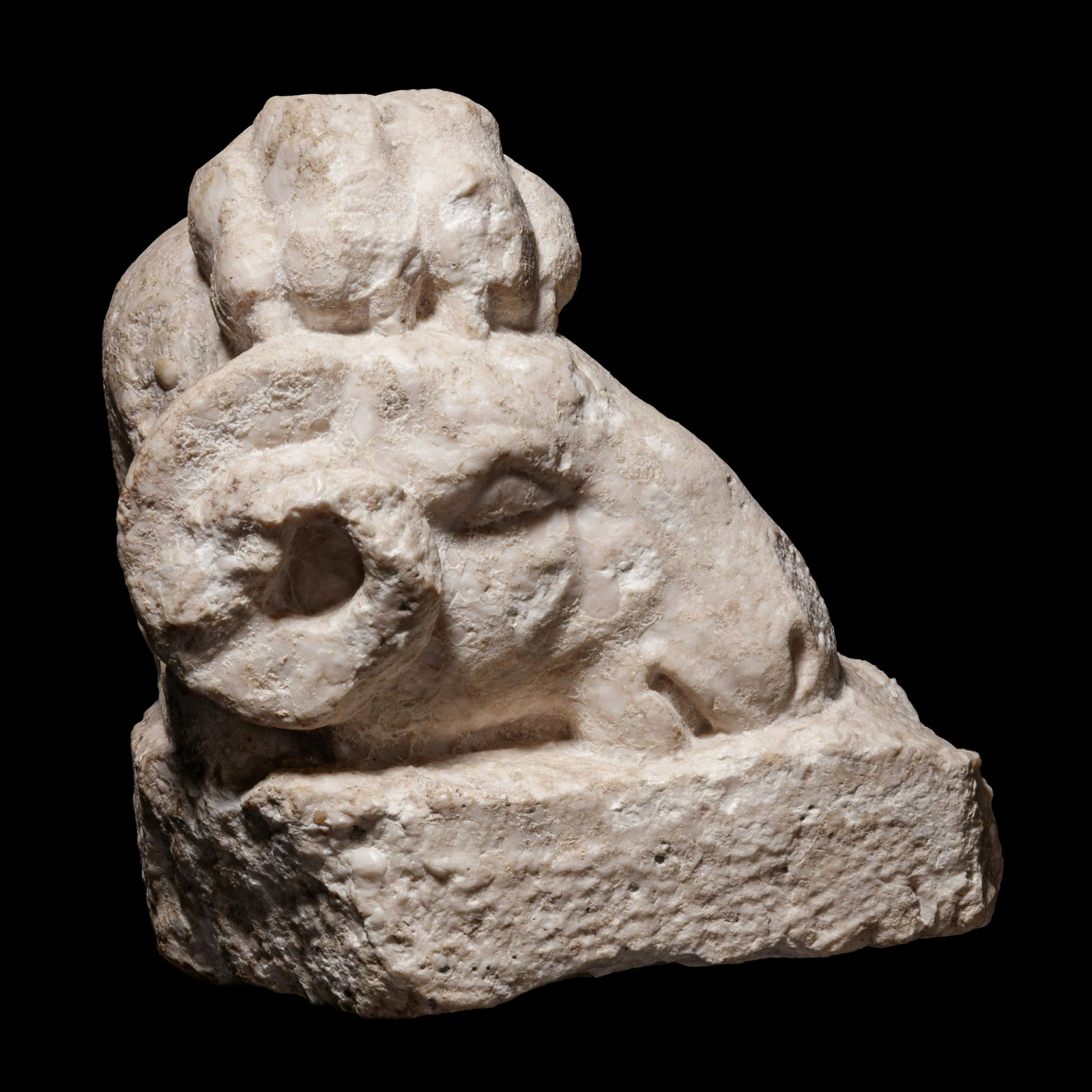 A Roman Marble Fragment with Head of Goat and Lion Paw: A Roman Marble Fragment with Head of Goat and Lion Paw Circa 1st-3rd Century A.D. Height 7 3/4 inches. Property from a Midwest Private Collection Provenance: Joel Malter, Encino, California, November 