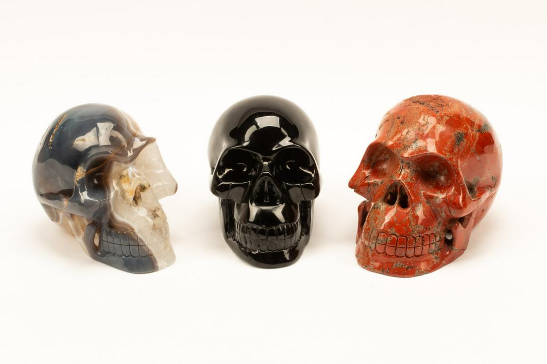 A Set of Three Obsidian, Agate and Red Jasper Skulls (1 of 2)