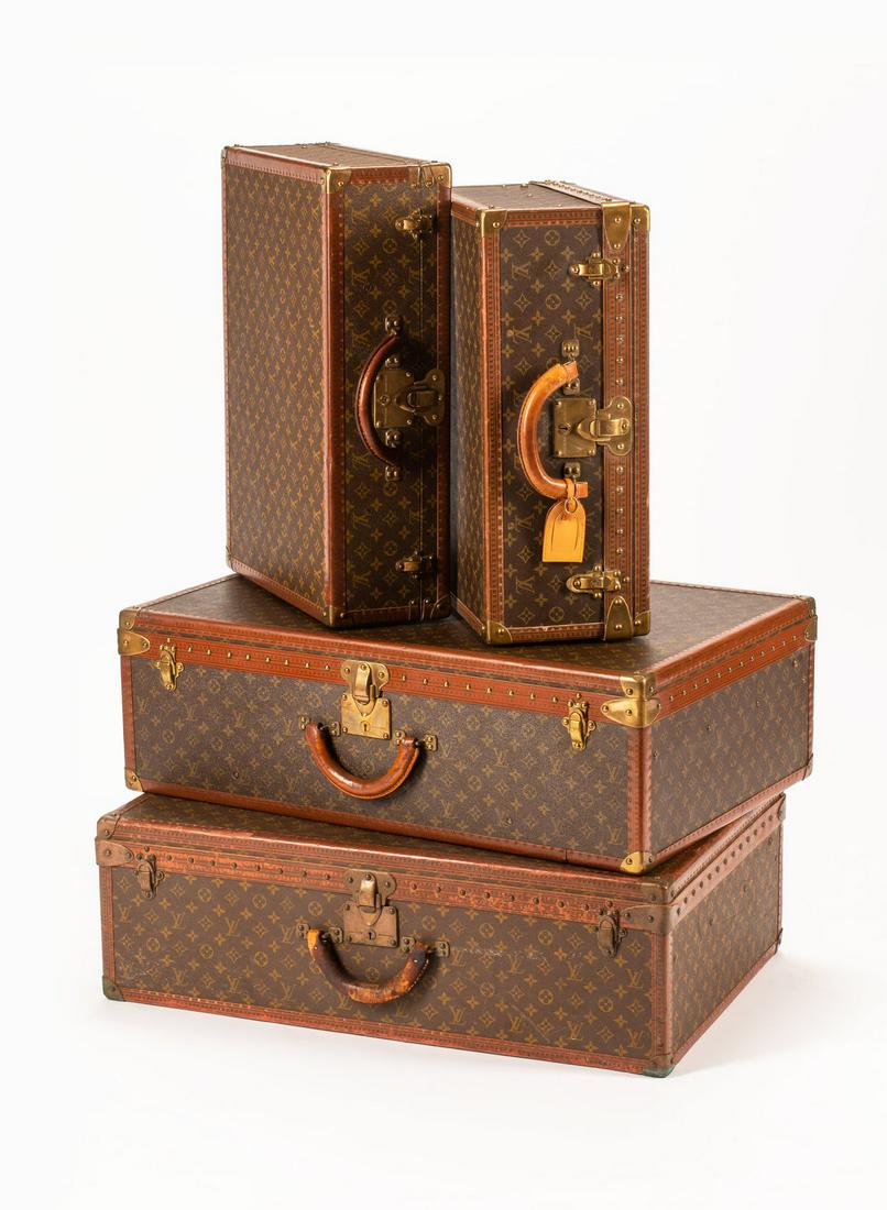 A Group of Four Louis Vuitton Hard-Sided Suitcases (1 of 1)