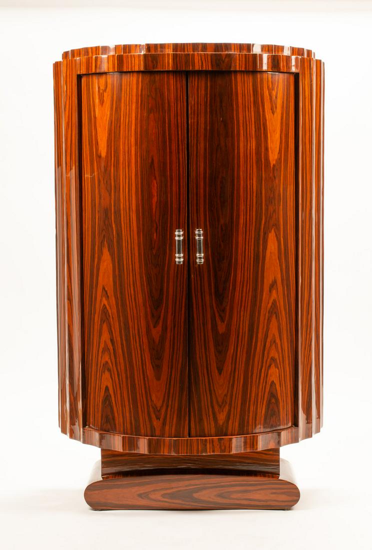 An Art Deco Style Rosewood Cabinet Height 64 x width 39: An Art Deco Style Rosewood Cabinet 20th Century Height 64 x width 39 1/2 x depth 19 inches.