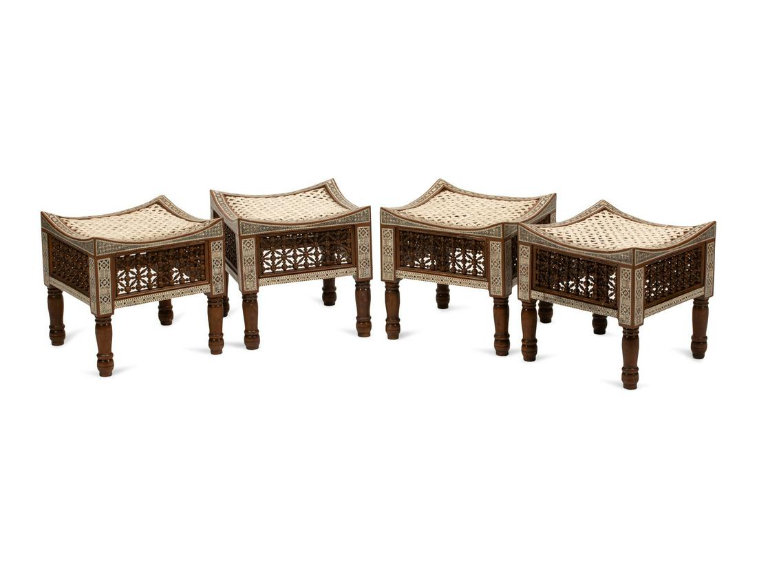 A Set of Four Moorish Style Inlaid Stools Height 14 1/2: A Set of Four Moorish Style Inlaid Stools 20th Century Height 14 1/2 x width 14 1/2 x depth 14 1/2 inches.