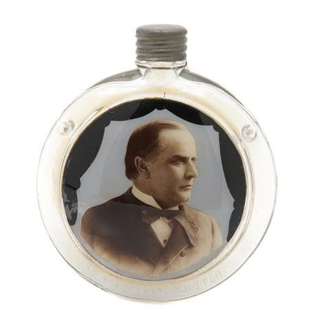 A Glass Presidential Campaign Flask, Height 5 1/8: A Glass Presidential Campaign Flask, of circular form, the reverse having impressed U.S. Height 5 1/8 inches. Property from the Collection of Joan Yunker, Park Ridge, Illinois