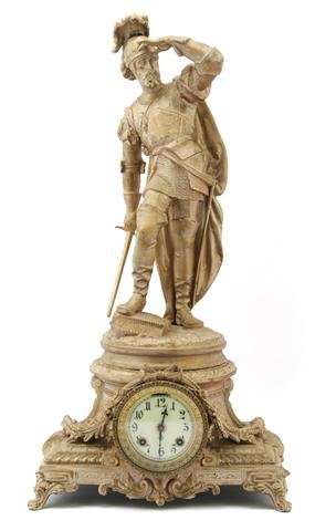 An American Gilt Metal Figural Mantle Clock, Anson: An American Gilt Metal Figural Mantle Clock, Ansonia, modeled as an explorer looking off into the distance with his sword over the circular dial with Arabic numerals, having time and strike movement. 