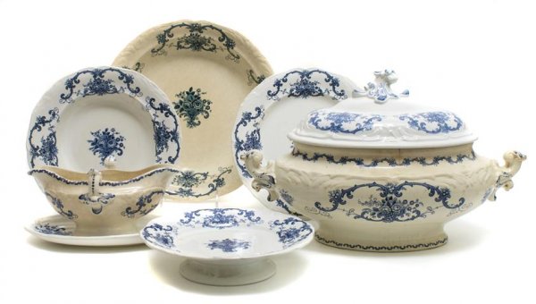 A Partial Set of French Transfer Decorated Dinnerw: A Partial Set of French Transfer Decorated Dinnerware, marked Rocaille BF, comprising a covered tureen, a gravy, 2 oval trays, 3 chargers, 3 footed serving dishes, 36 dinner plates, 18 salad plates an