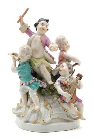 A Meissen Porcelain Figural Group, Height 5 3/4 in: A Meissen Porcelain Figural Group, depicting five children musicians, having crossed swords in underglaze blue. Height 5 3/4 inches. Property from the Estate of Ernest Trova, St. Louis, Missouri