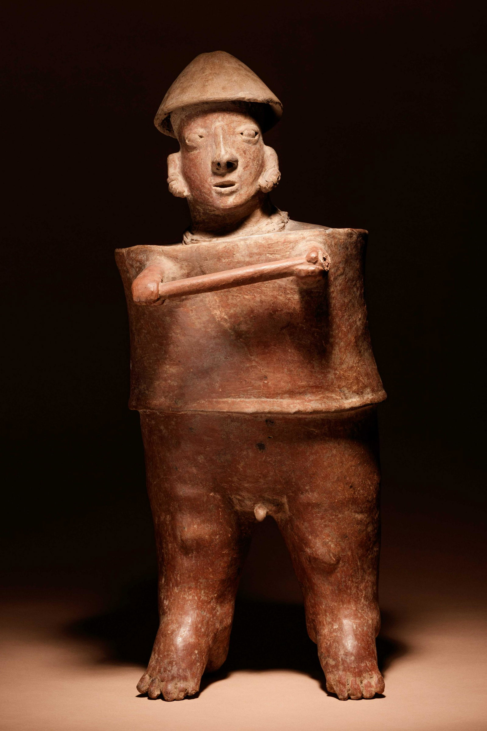 A Nayarit Terracotta Warrior Figure Height 23 inches. (1 of 3)