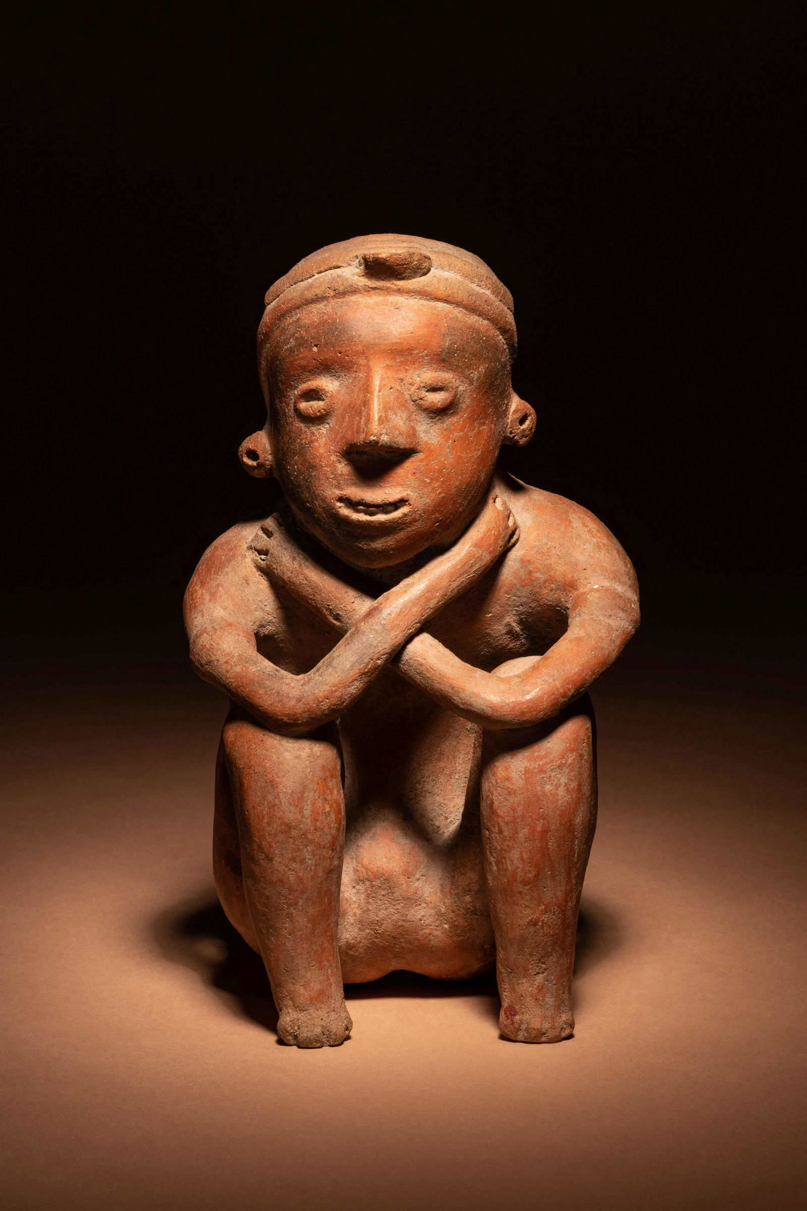 A Colima Terracotta Squatting Figure Height 8 1/2 (1 of 3)