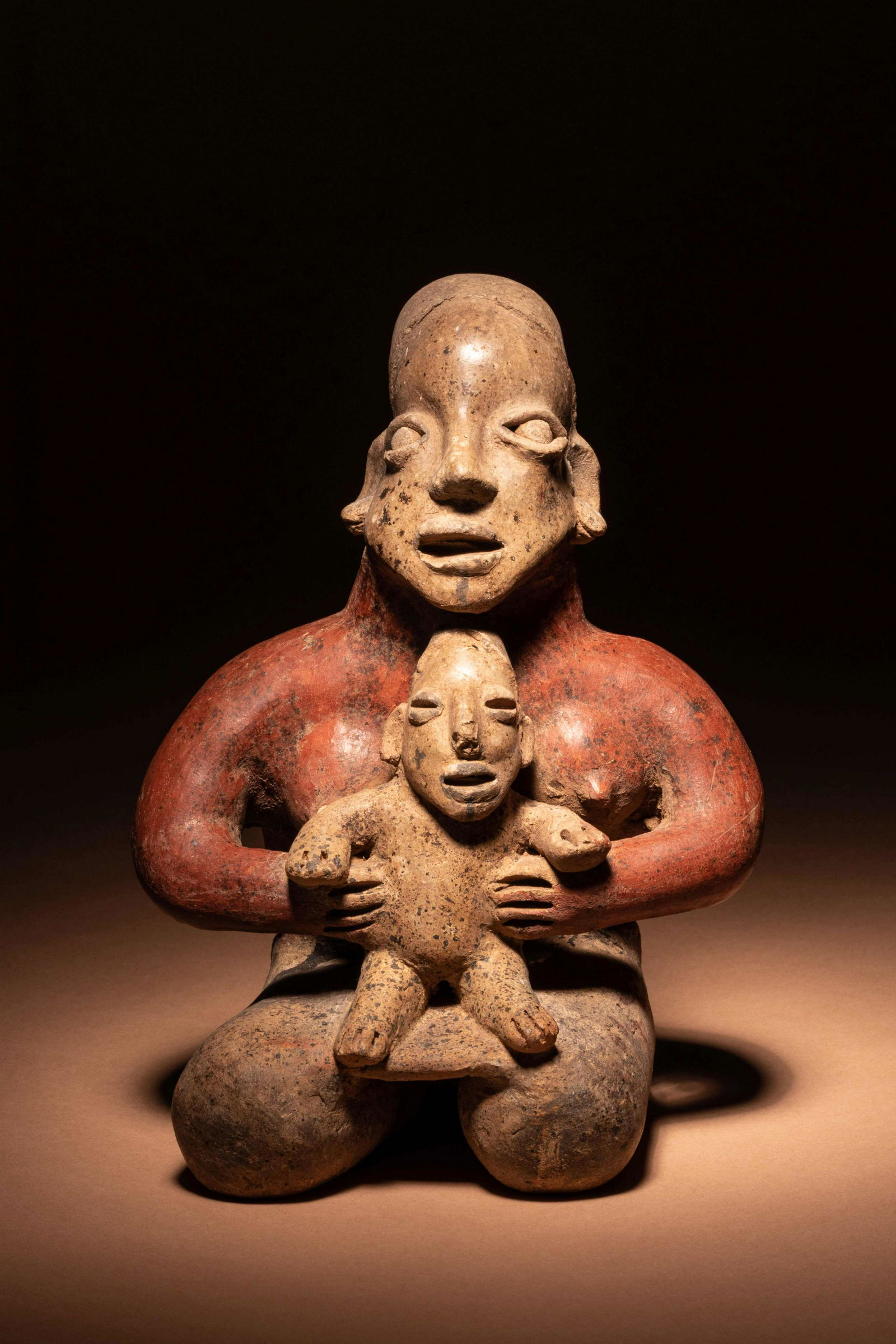 A Jalisco Kneeling Female Figure with Infant Height 8 (1 of 3)