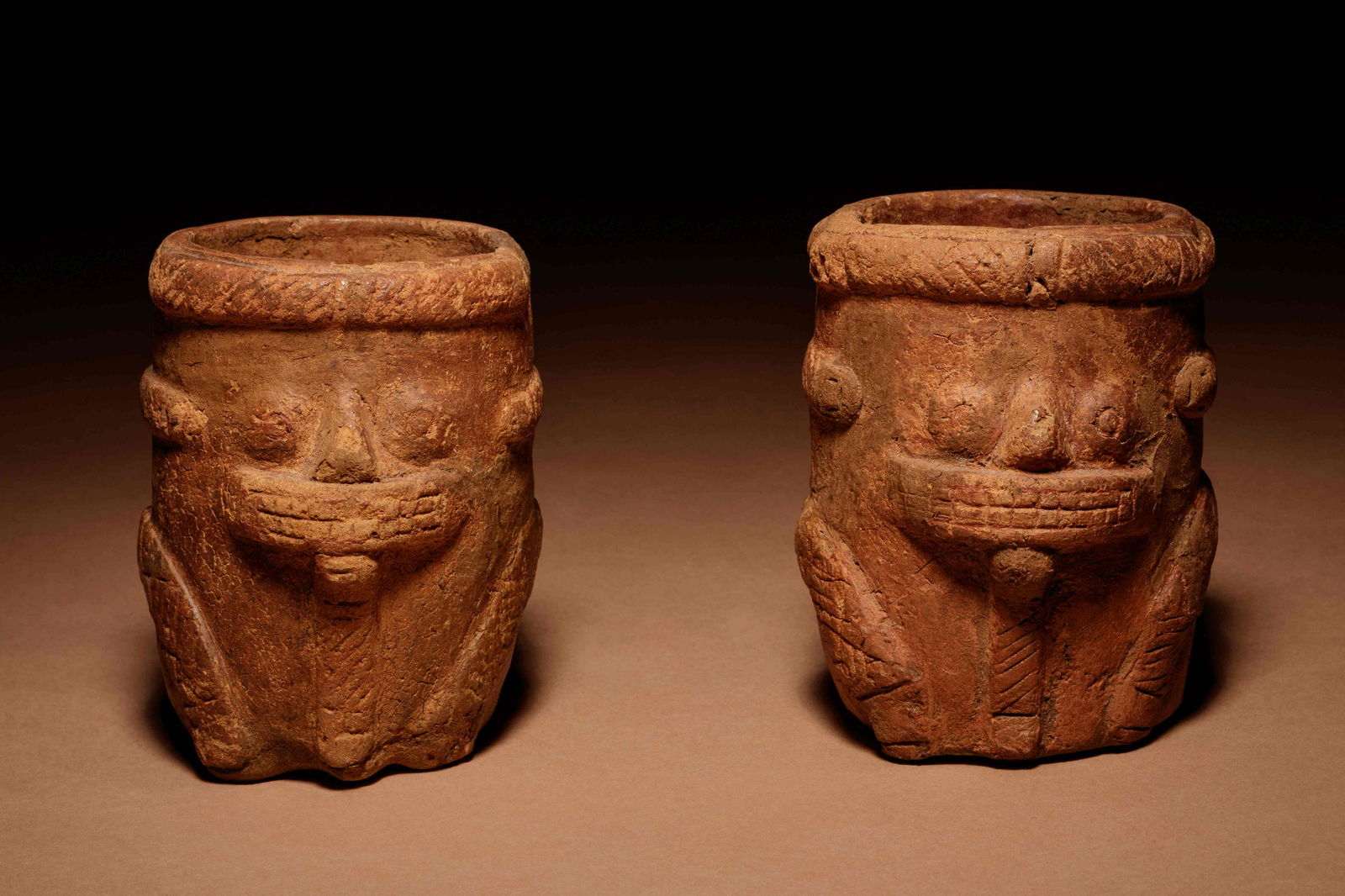 A Pair of Calima Terracotta Vessels Height of each 3 (1 of 3)