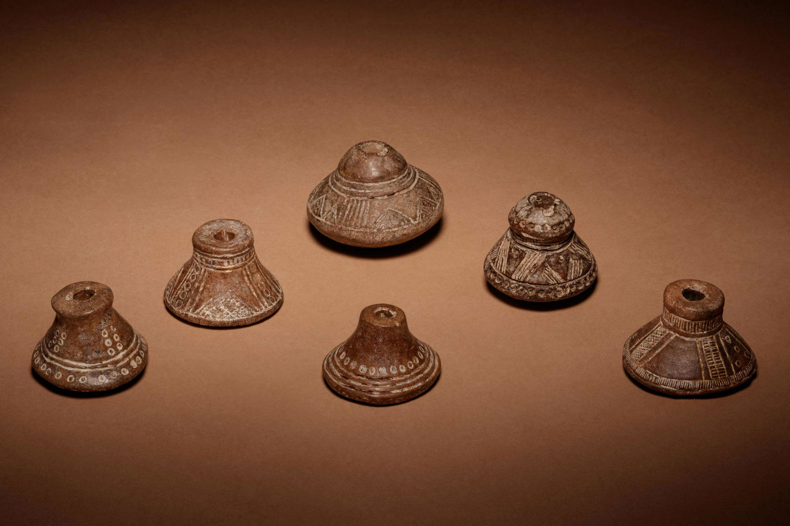 A Group of Six Quimbaya Terracotta Spindle Whorls Width (1 of 3)