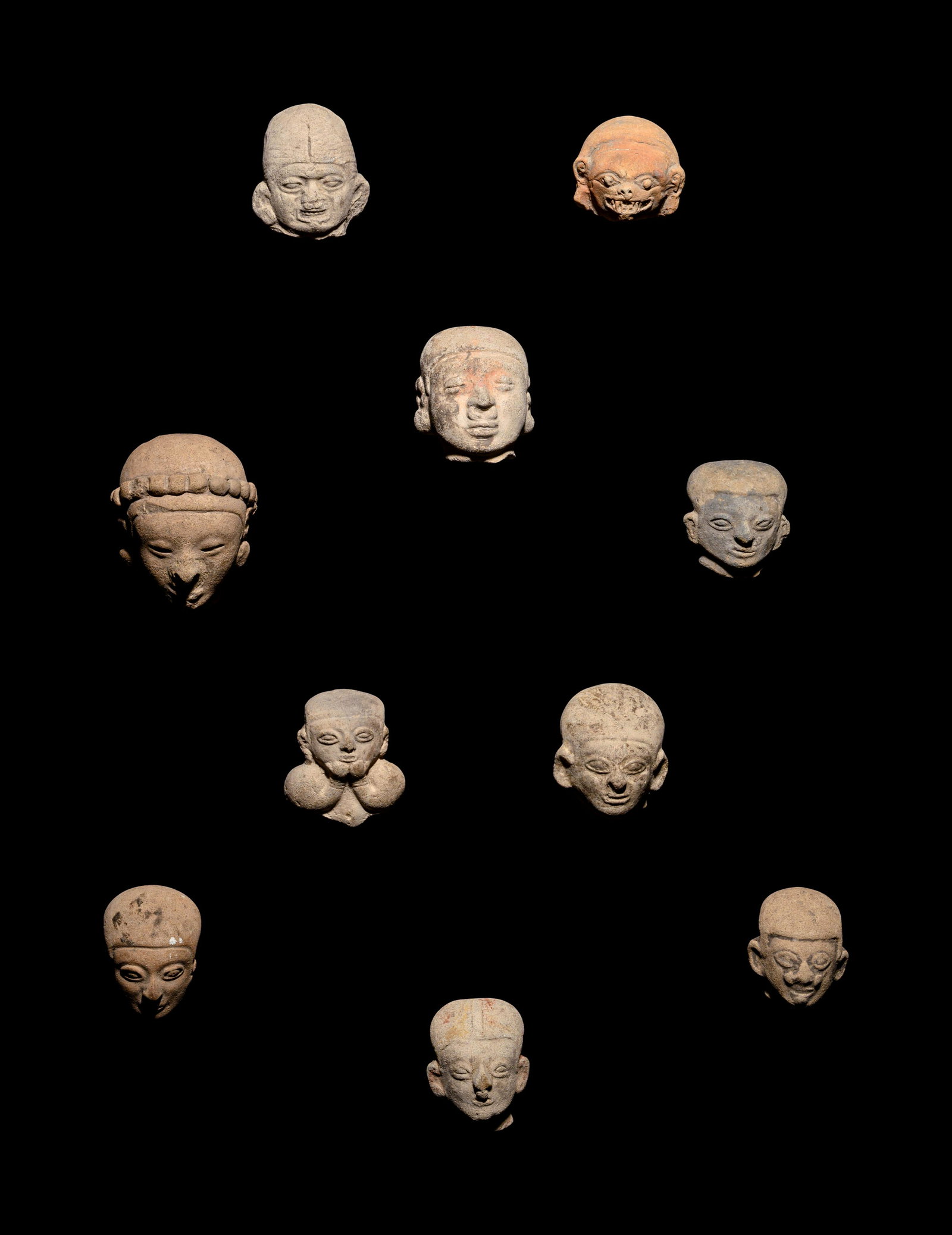 A Group of Ten Tumaco Terracotta Heads Height of (1 of 4)