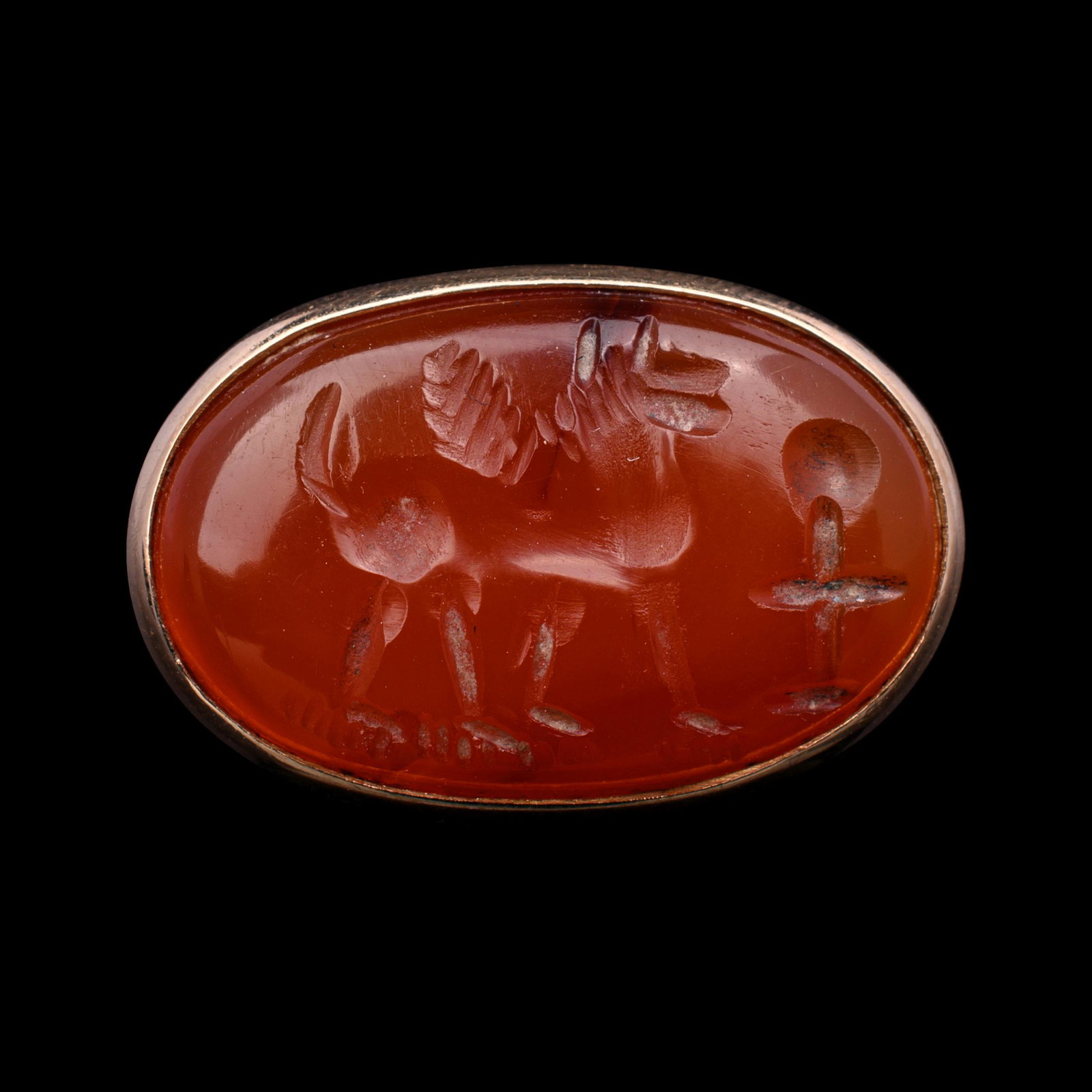 A Graeco-Persian Carnelian Ringstone with a Winged: A Graeco-Persian Carnelian Ringstone with a Winged Horse Circa Late 4th-Early 3rd Century B.C. Length of intaglio 7/8 inches; Ring size 9. Provenance: Private Collection, Newark, Delaware, prior to 19