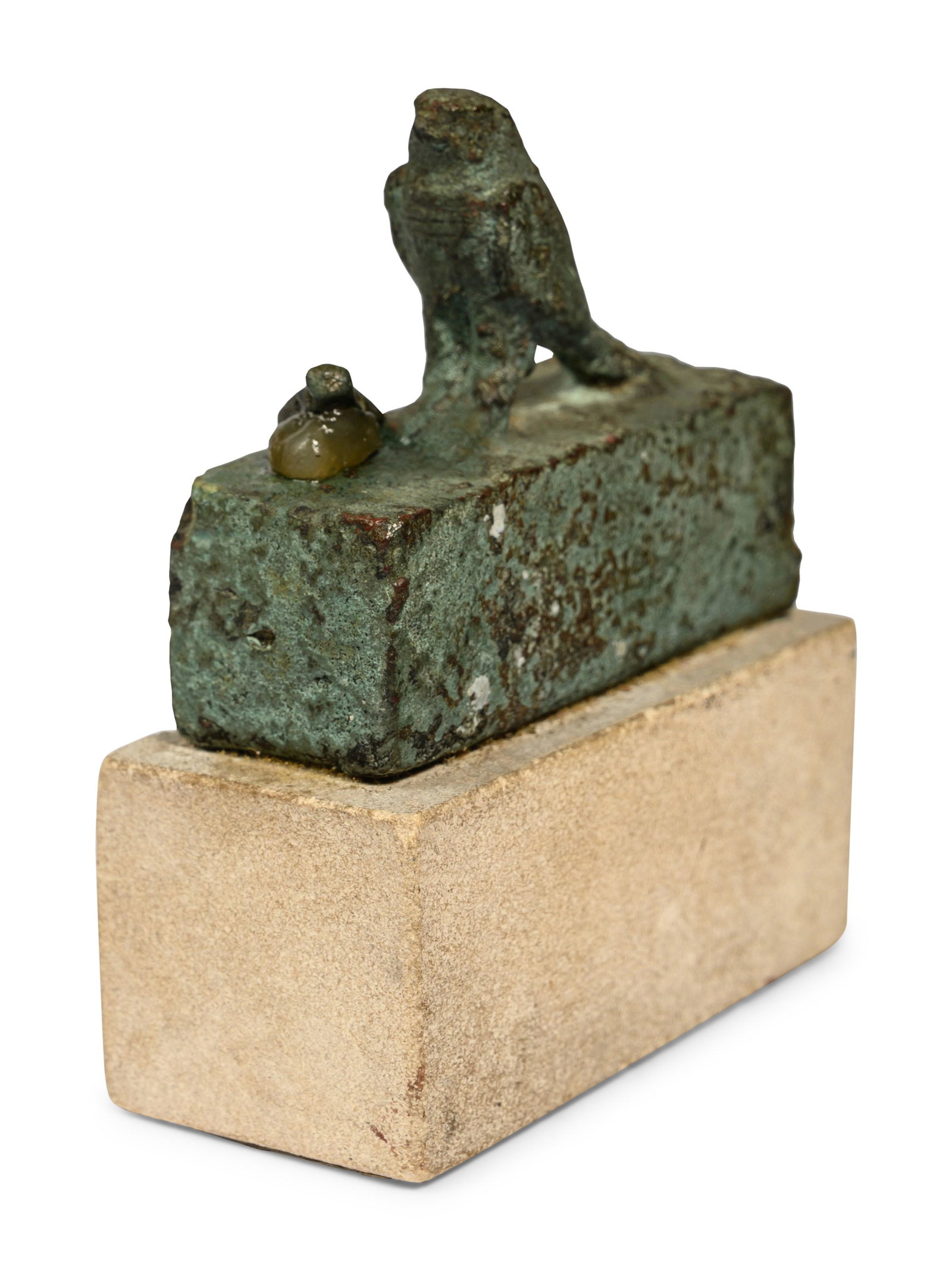 An Egyptian Bronze Falcon Coffin Height 1 3/4 inches. (1 of 4)