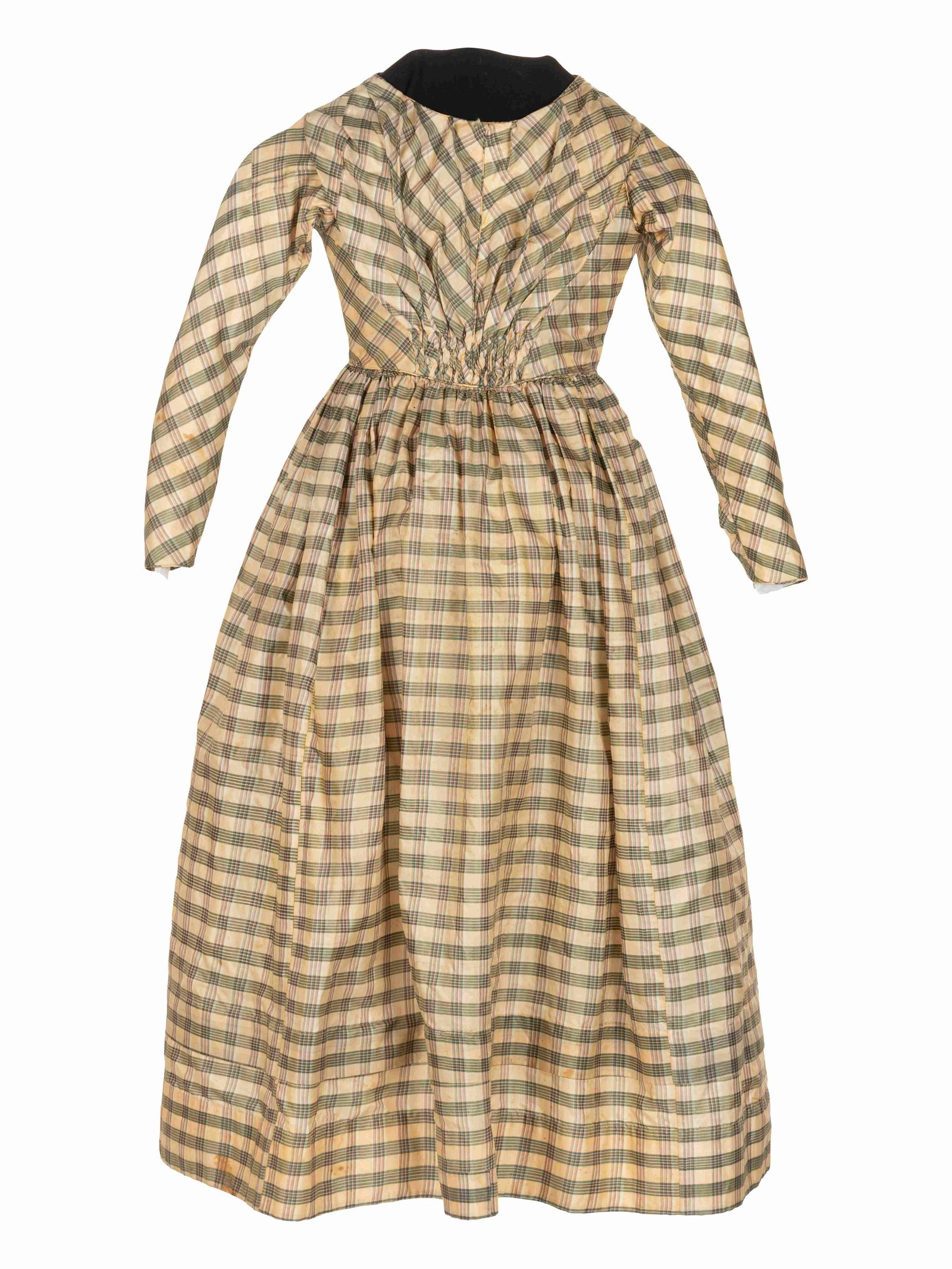 Silk Plaid Girl's Dress, 1850s: Silk Plaid Girl's Dress, 1850s This dress comes from the Tasha Tudor Collection of the Colonial Williamsburg Foundation. Tasha Tudor (nee Starling Burgess, 1915-2008) was a writer and illustrator of c