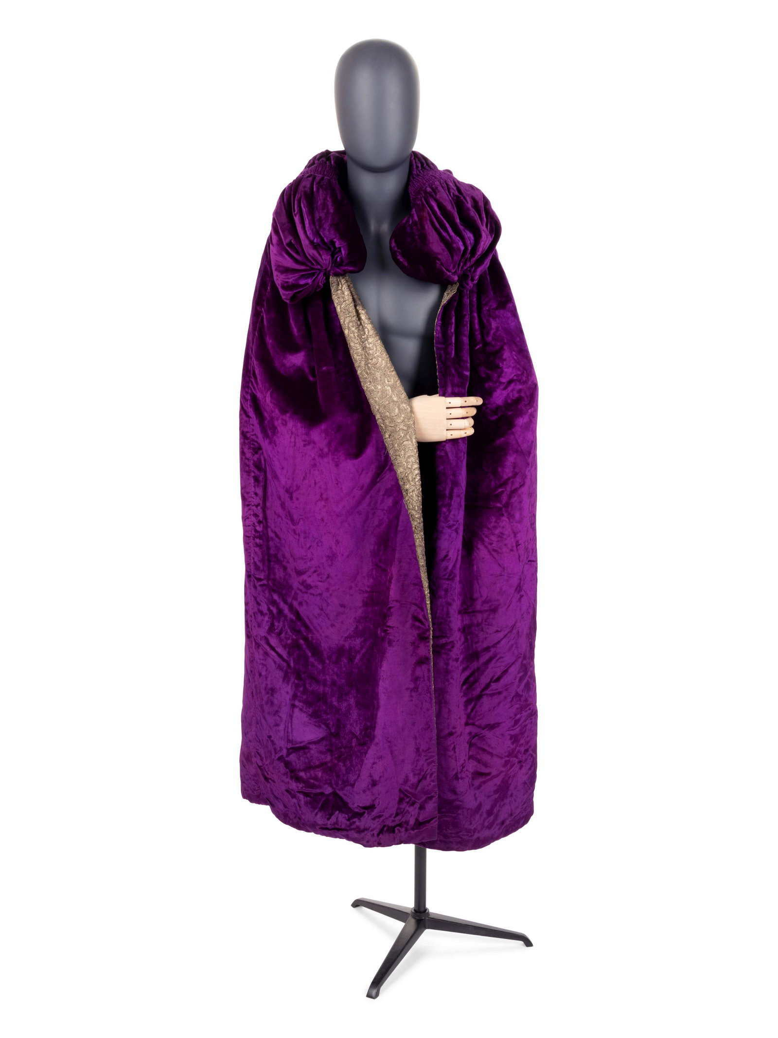 Velvet with Silver Thread Lame Cape, 1920s: Velvet with Silver Thread Lame Cape, 1920s Purple silk panne velvet open front cape with metal silver-thread lame lining, and stuffed velvet collar with smock detail. Unlabeled Style/Serial No.: N/A A