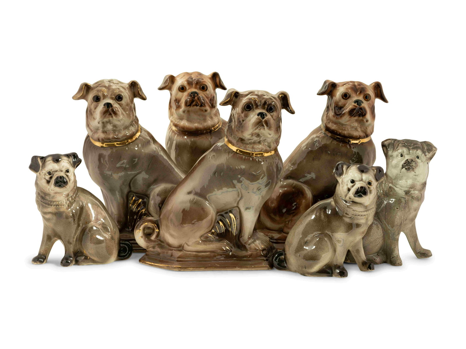 A Group of Staffordshire and Other Models of Pugs: A Group of Staffordshire and Other Models of Pugs 7 items total. Height of tallest pair 12 inches. Property from The Estate of Heather Graham Glickman, Chicago, Illinois