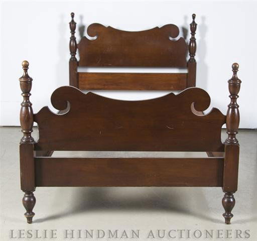 A Pair of American Twin Bed Frames, Height of headb: A Pair of American Twin Bed Frames, early 20th century, comprising two headboards, two footboards and four side rails, the headboard and footboard raised on turned legs. Height of headboard 40 3/4 inc