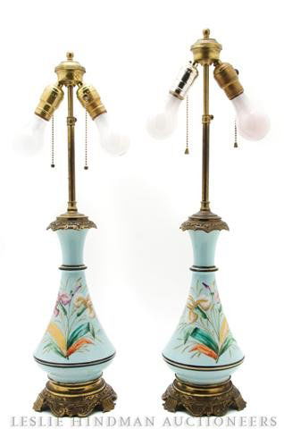 A Pair of Continental Porcelain Vases, Height 11 1: A Pair of Continental Porcelain Vases, mounted as lamps, each of tapering bottle form with gilt and polychrome decoration. Height 11 1/2 inches. Property from the Estate of Ernest Trova, St. Louis, Mi