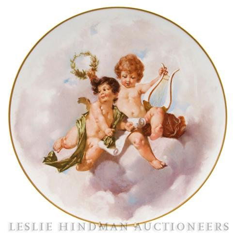 A (K.P.M.) Porcelain Charger, Diameter 15 3/4 inch: A (K.P.M.) Porcelain Charger, decorated with two putti in the clouds. Diameter 15 3/4 inches. Property from the Estate of Ernest Trova, St. Louis, Missouri