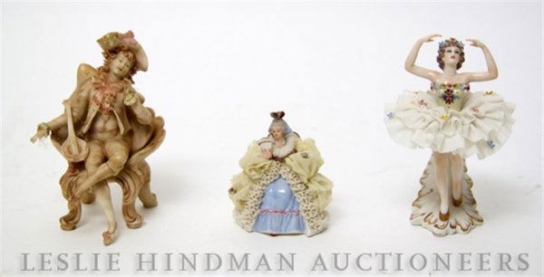 A Collection of Three Continental Figurines, Heigh: A Collection of Three Continental Figurines, comprising a Capodimonte figure of a ballerina, a German figure of a seated girl and a seated gentleman. Height of first 5 1/4 inches.
