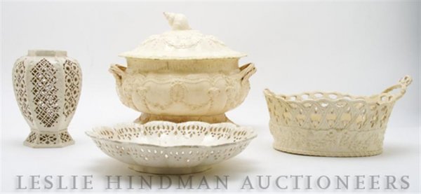A Collection of Creamware Articles, Height of firs: A Collection of Creamware Articles, comprising a lidded tureen, a handled basket, lacking one handle, a reticulated dish and a vase with pierced decoration, each having cracks and repairs throughout;