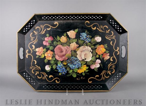 A Tole Tray, Length 26 1/2 x width 18 1/2 inches.: A Tole Tray, having pierced decoration with polychrome floral decoration throughout. Length 26 1/2 x width 18 1/2 inches.