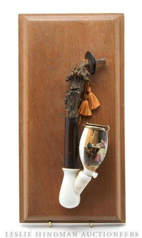 A German Porcelain Pipe, Length 9 1/4 inches.: A German Porcelain Pipe, having horn mouthpiece with antler and birch handle. Length 9 1/4 inches. Property from the Collection of Joan Yunker, Park Ridge, Illinois
