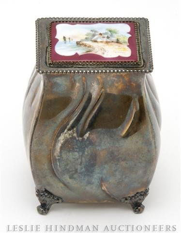 A Silverplate Tea Caddy, Height 5 1/4 inches.: A Silverplate Tea Caddy, having a porcelain inset lid. Height 5 1/4 inches. Property from the Estate of Ernest Trova, St. Louis, Missouri