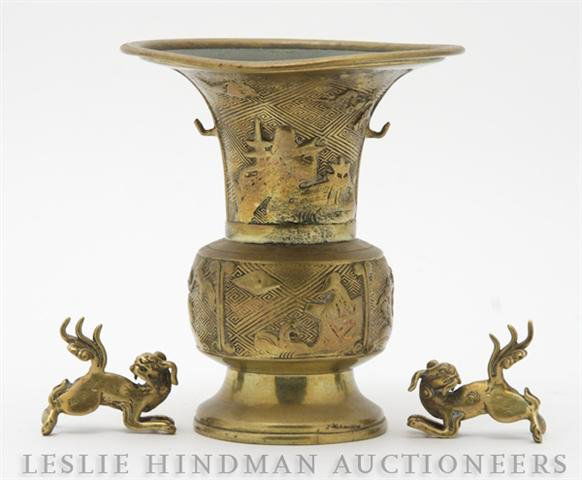 A Collection of Asian Decorative Articles, Height: A Collection of Asian Decorative Articles, comprising a brass vase and two figures. Height of first 6 1/2 inches. Property from the Estate of Ernest Trova, St. Louis, Missouri