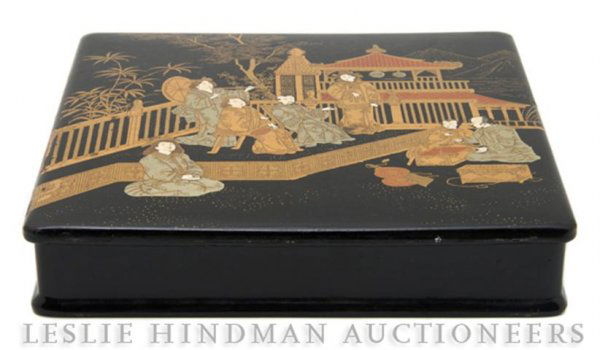 A Japanese Lacquer and Giltwood Box, Length 7 1/2: A Japanese Lacquer and Giltwood Box, depicting figures in a courtyard. Length 7 1/2 inches. Property from the Estate of Ernest Trova, St. Louis, Missouri