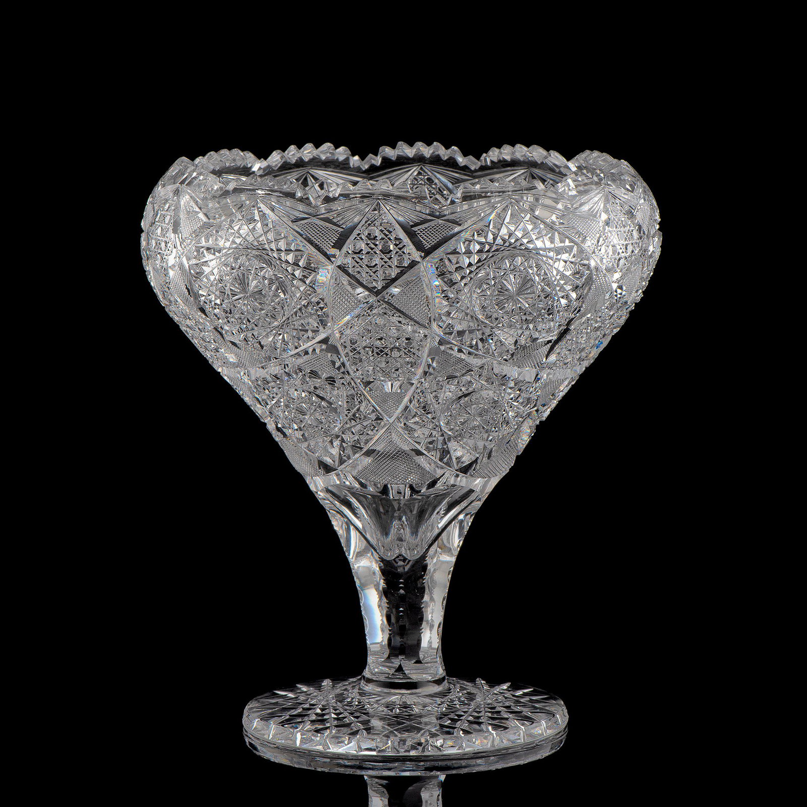 A Brilliant-Period Cut Glass Bulbous Vase with Hobstars: A Brilliant-Period Cut Glass Bulbous Vase with Hobstars Height 10 inches.