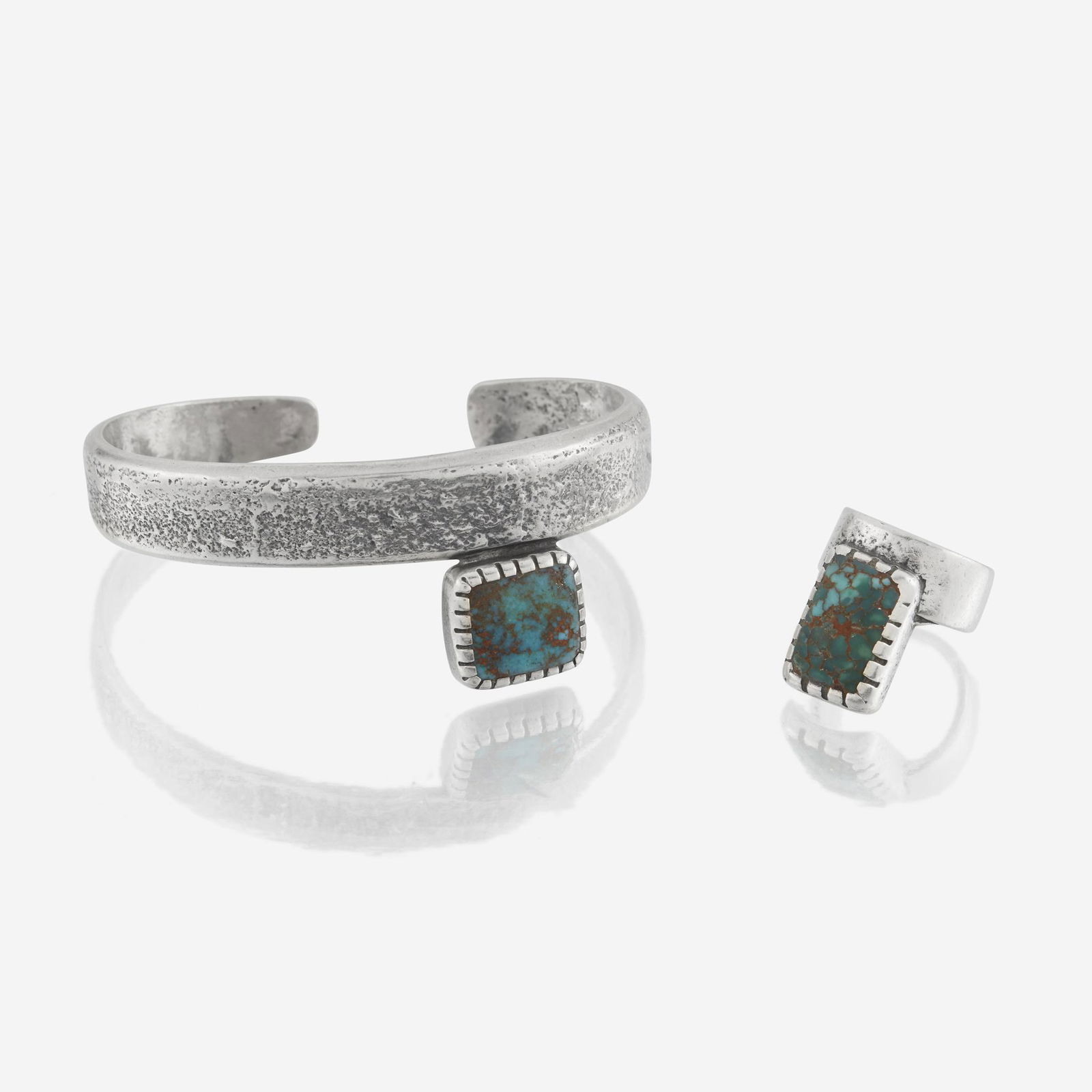 A sterling silver and turquoise bracelet and ring with (1 of 3)
