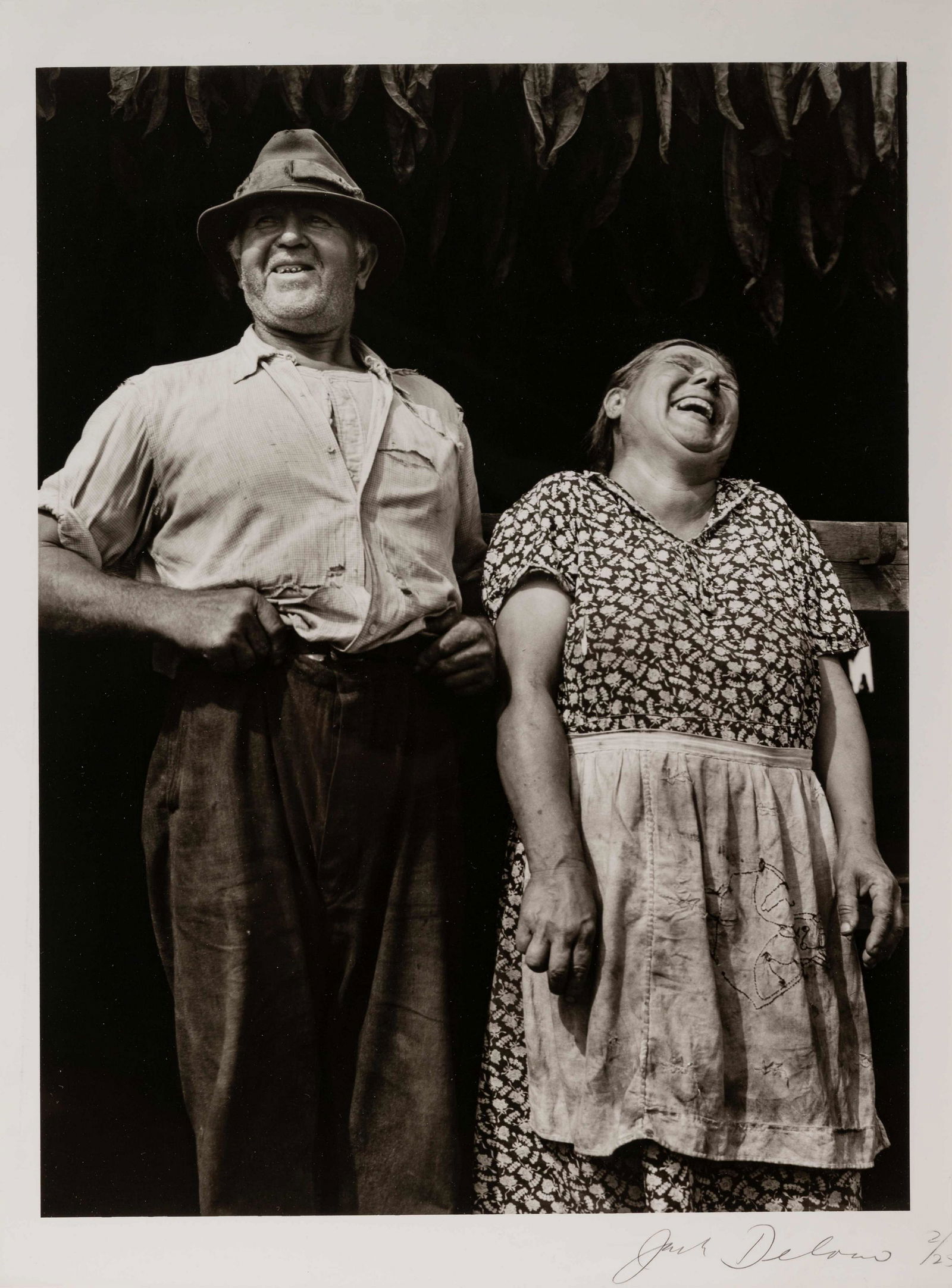 Jack Delano (American, 1914-1997) Laughing Tobacco: Jack Delano (American, 1914-1997) Laughing Tobacco Farmers, Near Windsor Locks, Connecticut, 1940 (printed 1978) gelatin silver print signed and numbered 2/25 in pencil (mount recto) 12 x 9 inc
