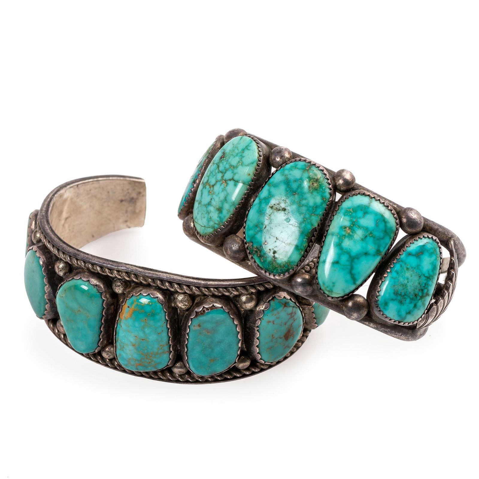 Navajo Silver and Turquoise Cuff Bracelets: Navajo Silver and Turquoise Cuff Bracelets third quarter 20th century lot of 2, includes: one unmarked, cuff width 1-1/8 inches, interior circumference 5-1/4 inches x gap length 1-1/4 inches, weight 4
