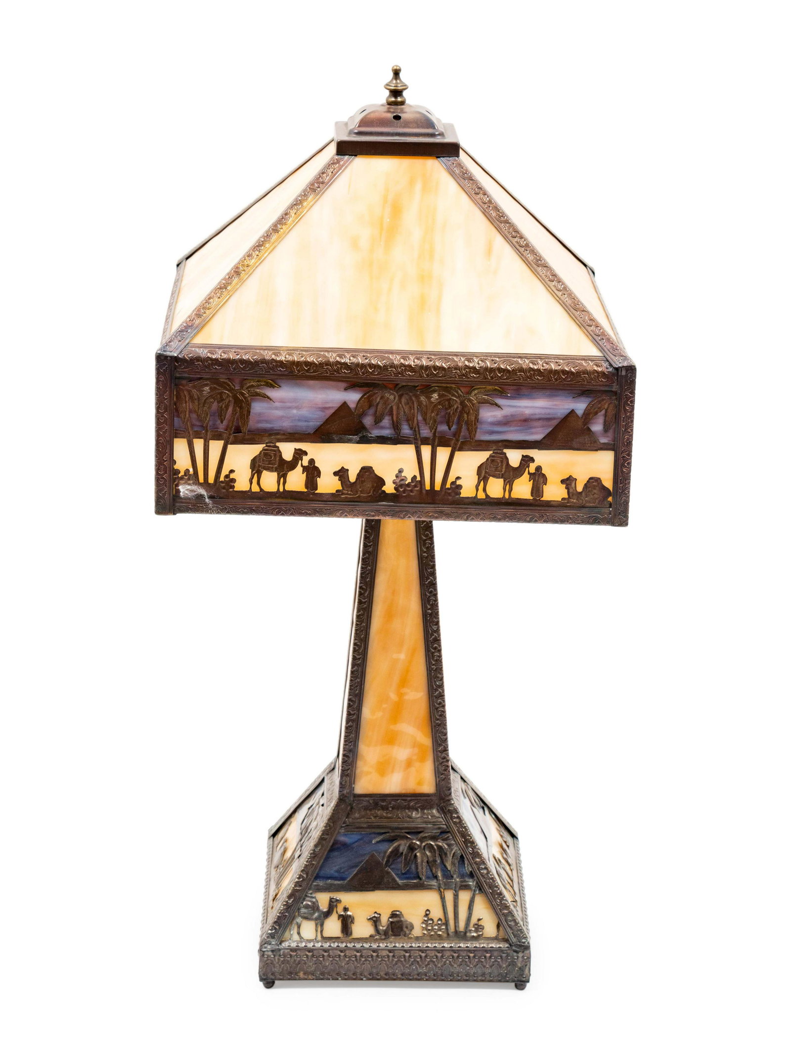 An Egyptian Motif Slag Glass Lamp height 24 inches: An Egyptian Motif Slag Glass Lamp20th Centurywith embossed metal depicting scenes of the pyramidsheight 24 inchesProperty from the Estate of Edgar Foster Daniels, Santa Fe, New Mexico