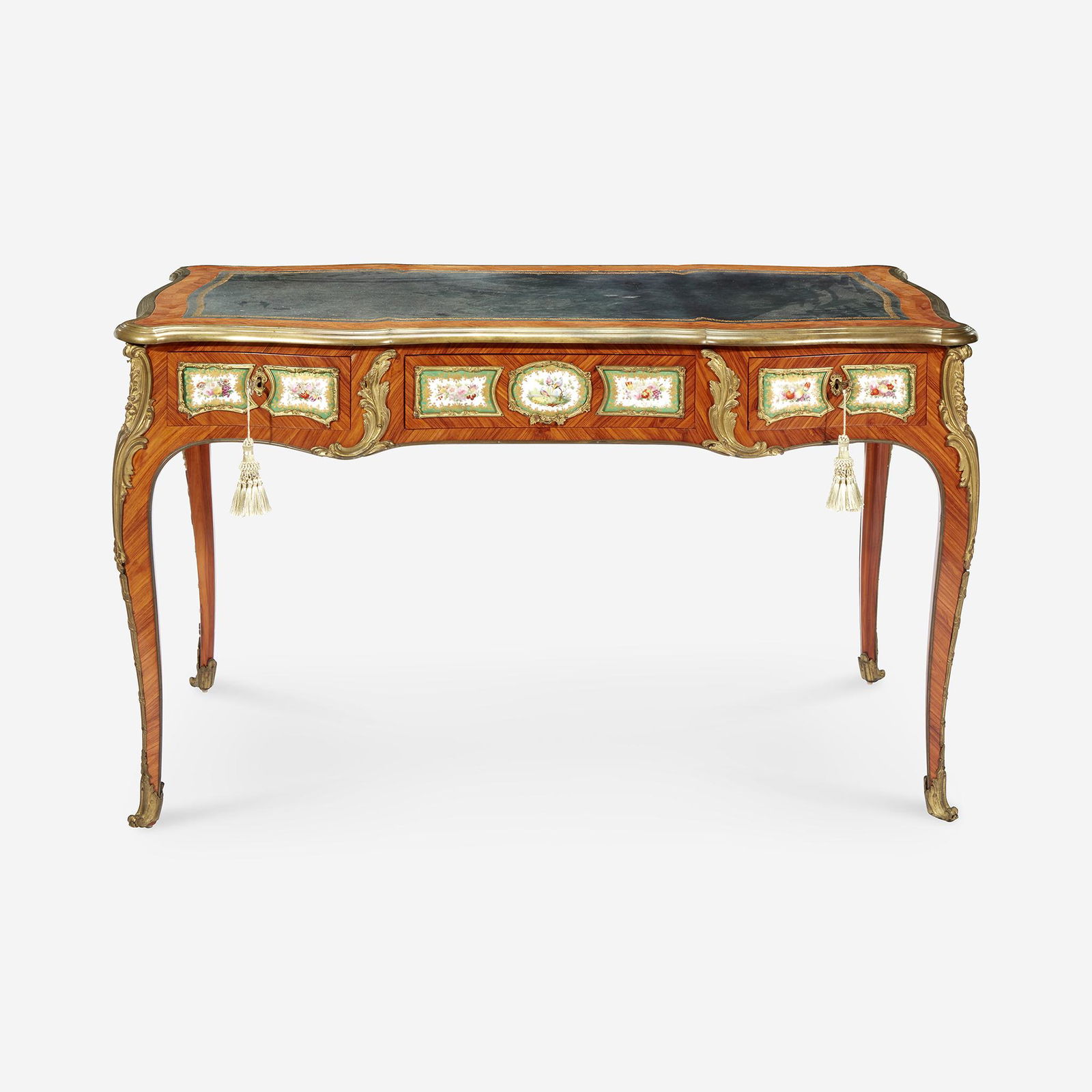 A Louis XV Style Gilt-Bronze and Sèvres Style: A Louis XV Style Gilt-Bronze and Sèvres Style Porcelain-Mounted Kingwood Bureau Plat With the mark of Edward Holmes Baldock, early 19th century Containing twenty green Sèvres style painted p