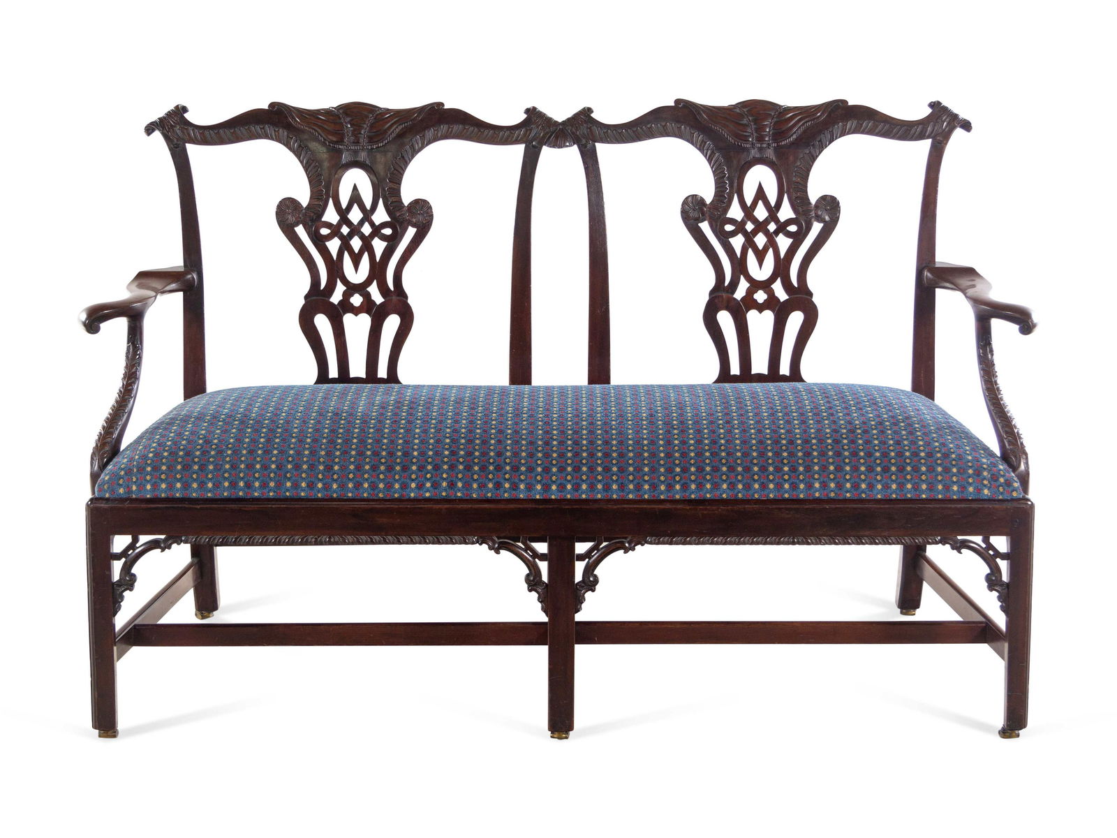 A George III Style Carved Mahogany Double Chair-Back: A George III Style Carved Mahogany Double Chair-Back Settee after a Design by Thomas Chippendale Mid-19th Century Height 38 1/2 x width 60 x depth 23 1/2 inches. Property from the Collection of Mary S
