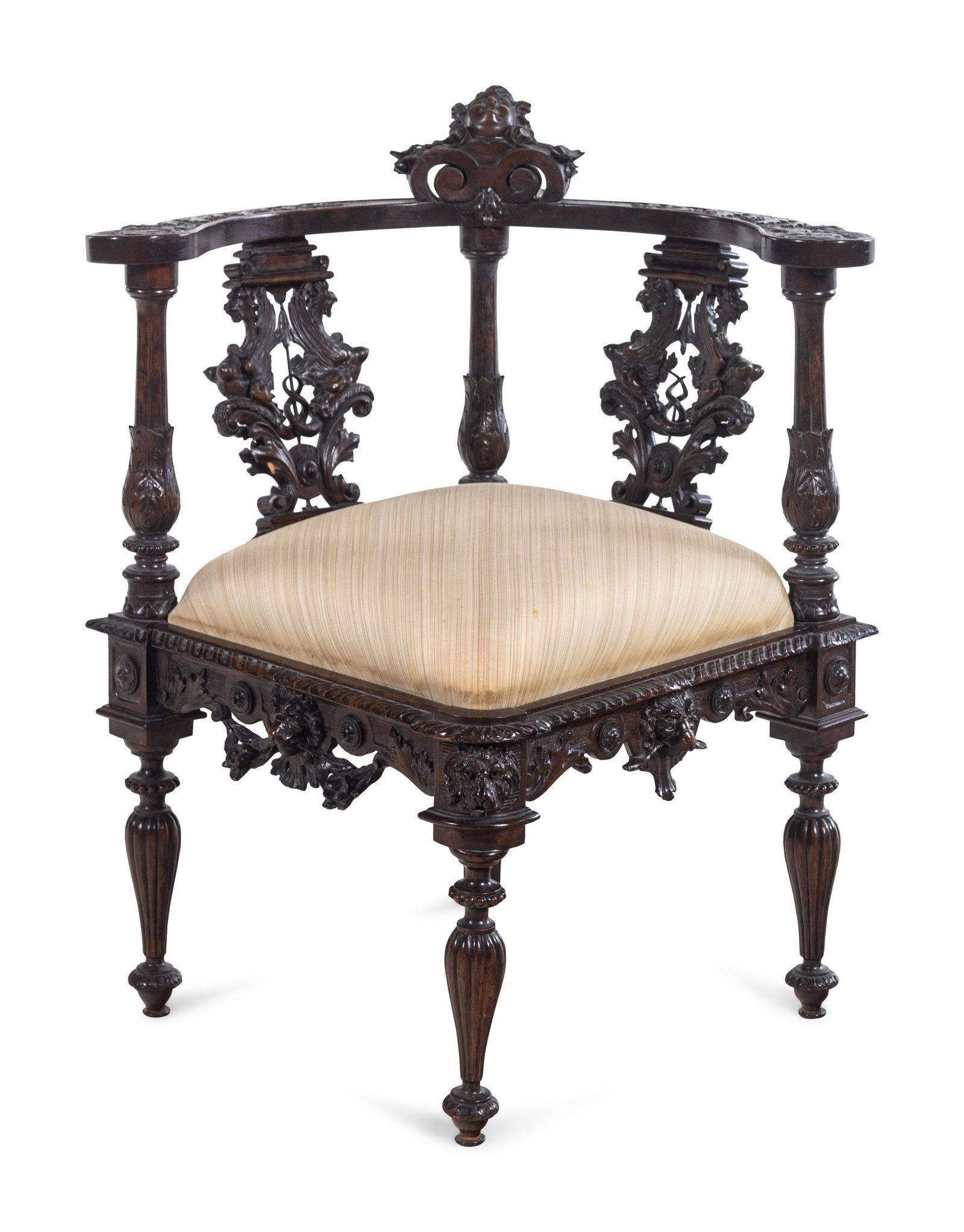 A Renaissance Revival Carved Walnut Corner Chair: A Renaissance Revival Carved Walnut Corner Chair Late 19th Century Height 33 x width 23 x depth 23 inches. Property from the Collection of David and Bess Siegel, Milwaukee, Wisconsin