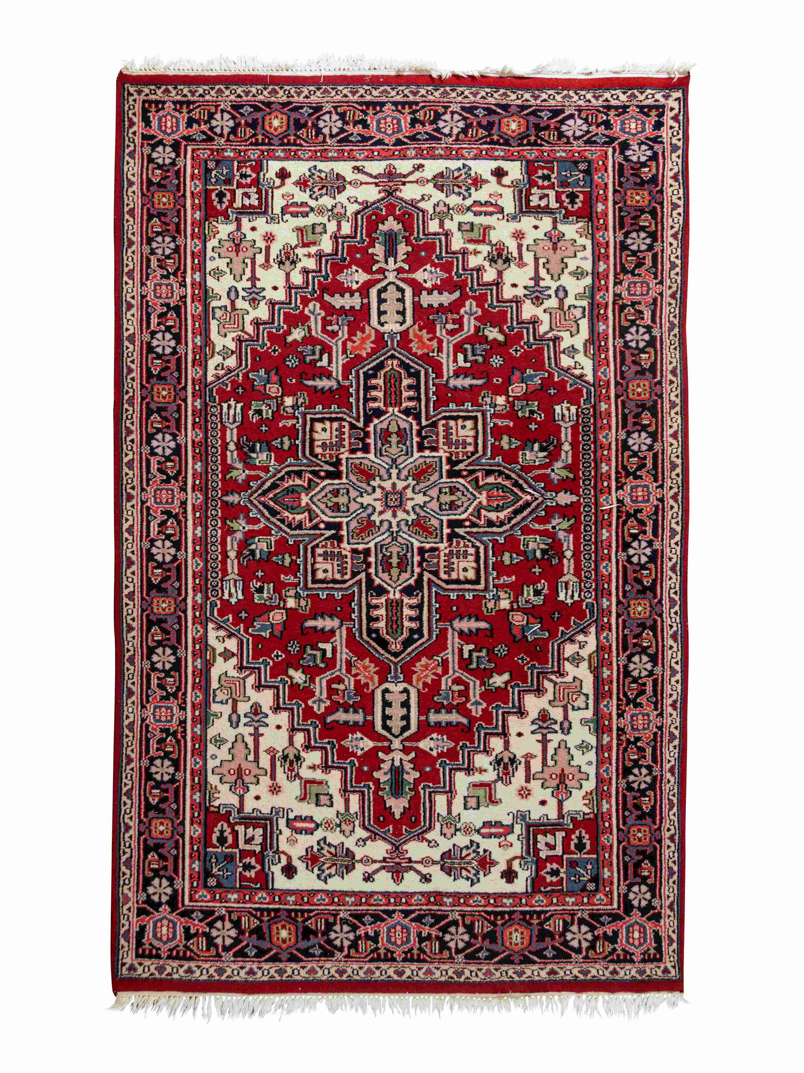 A Heriz Wool Rug: A Heriz Wool Rug Mid-20th Century 5 feet 6 inches x 3 feet 9 inches. Property from Bishop's Hall and the Collection of Richard Sander and Fiona Harrison, Oak Park, Illinois Note: The home located at 6