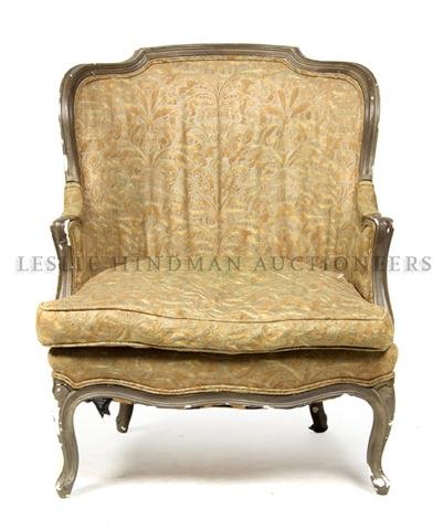 A Louis XVI Style Painted Bergere, Height 54 3/4 i: A Louis XVI Style Painted Bergere, having upholstered back, arms and seat raised on cabriole legs. Height 54 3/4 inches.