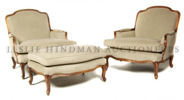 A Louis XVI Provincial Duchesse Brisee, Height of : A Louis XVI Provincial Duchesse Brisee, comprised of two bergeres with upholstered backs, arms and seats, together with a conforming ottoman. Height of chairs 35 1/2 inches.