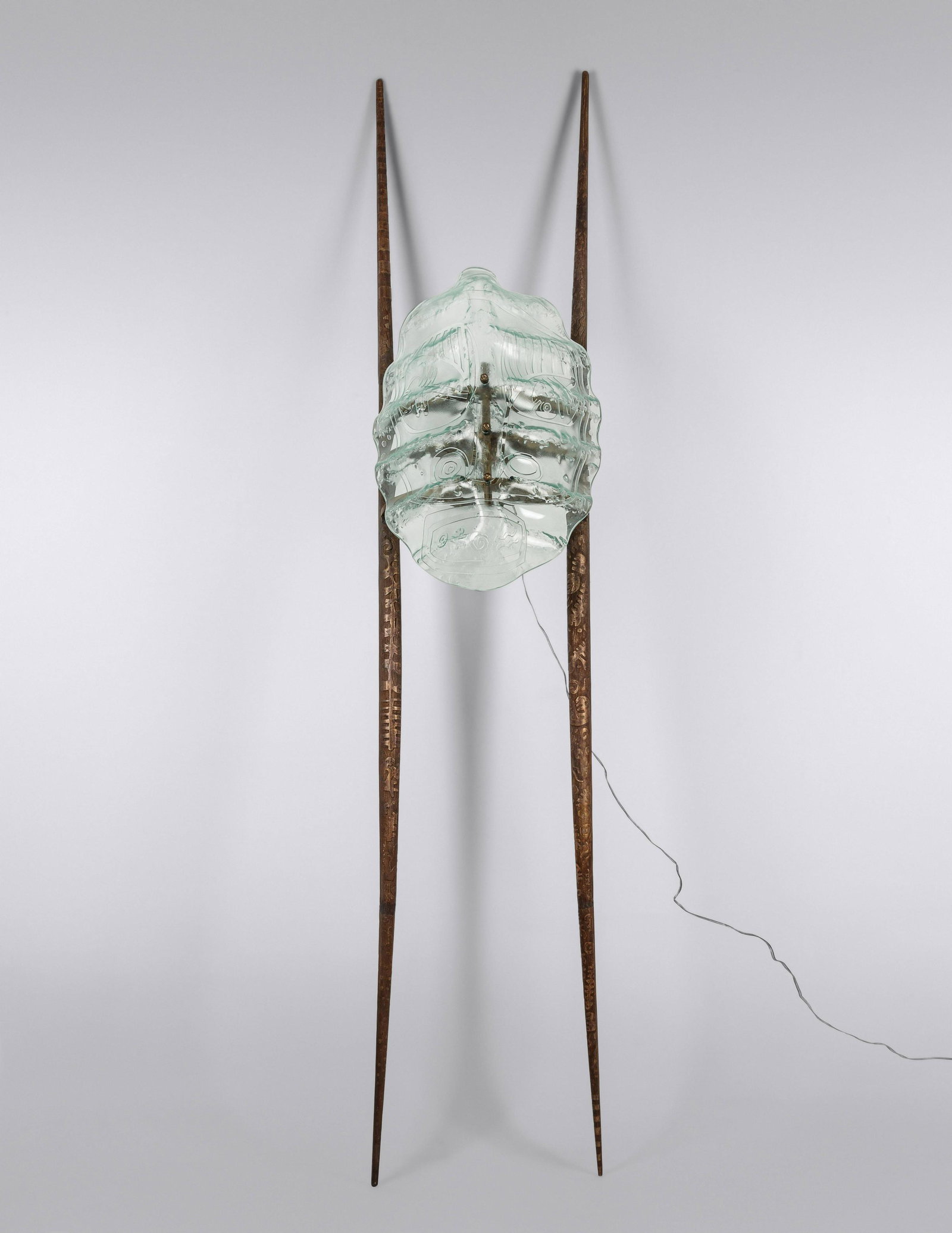 Terence Main (American, b. 1954) Amity, from Apparition: Terence Main (American, b. 1954) Amity, from Apparition Series, 1989 cast bronze, glass, 12v Halogen lamp inscribed Main, titled and dated 90 x 18 x 15 inches. Sold to Benefit the Acquisition Fund of 