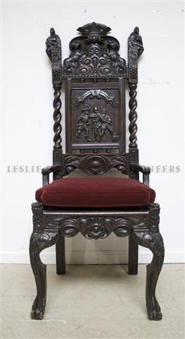 A Renaissance Revival Style Side Chair, Height 49 inche: A Renaissance Revival Style Side Chair, 19th century, the upholstered seat set within a heavily carved frame raised on claw and ball feet. Height 49 inches.