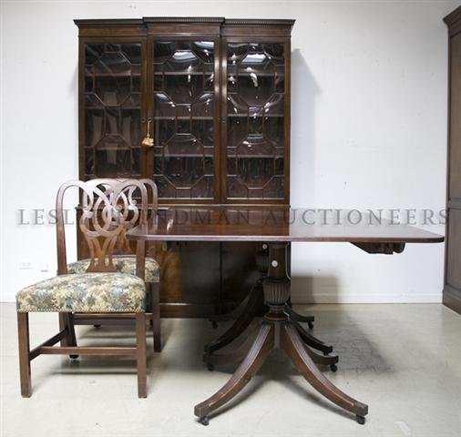 An American Dining Suite, Baker, Height of china cabine: An American Dining Suite, Baker, comprising a twin pedestal table with three leaves, six side chairs, a buffet and a china cabinet with glazed doors. Height of china cabinet 79 3/4 x width 60 x depth 