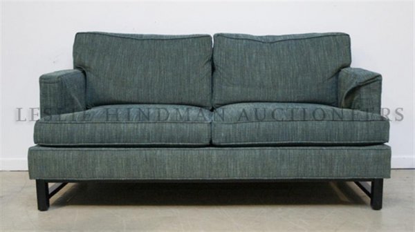 A Contemporary Upholstered Sofa, Edward Wormley for Dun: A Contemporary Upholstered Sofa, Edward Wormley for Dunbar, the upholstered back, arms and seat raised on block legs joined by stretchers. Height 26 1/2 x width 60 x depth 33 inches.