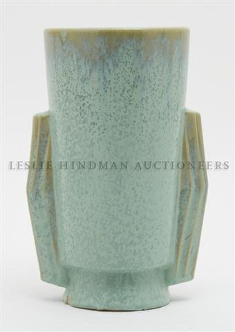 An American Fulper Pottery Vase, Height 8 3/4 inches.: An American Fulper Pottery Vase, having a green glaze, of round tapering form with two Art Deco handles, the base incised Fulper, further marked 863. Height 8 3/4 inches.