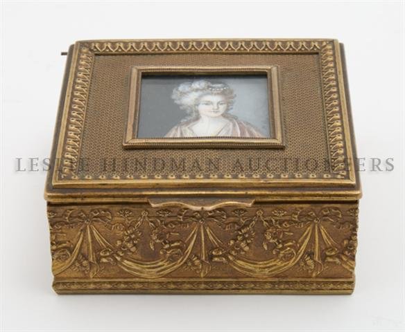 A French Gilt Metal Box, Height 1 3/8 x width 3 3/8 x d: A French Gilt Metal Box, of square form, the lift centered with a portrait miniature of a woman signed M. Roy, the box itself stamped France with HV foundry mark. Height 1 3/8 x width 3 3/8 x depth 3 