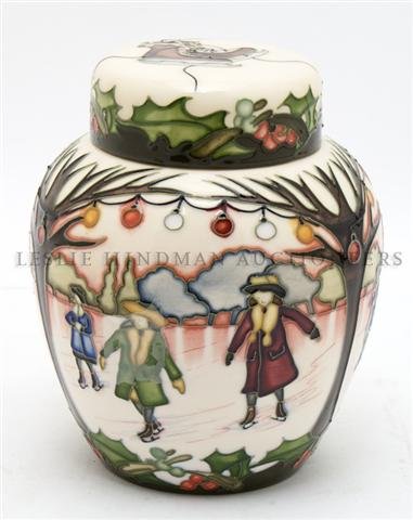 A Moorcroft Pottery Ginger Jar, Height 6 inches.: A Moorcroft Pottery Ginger Jar, depicting skaters surrounded by trees and Christmas ornaments, designed by Paul Hilditch, limited edition 243/250. Height 6 inches.